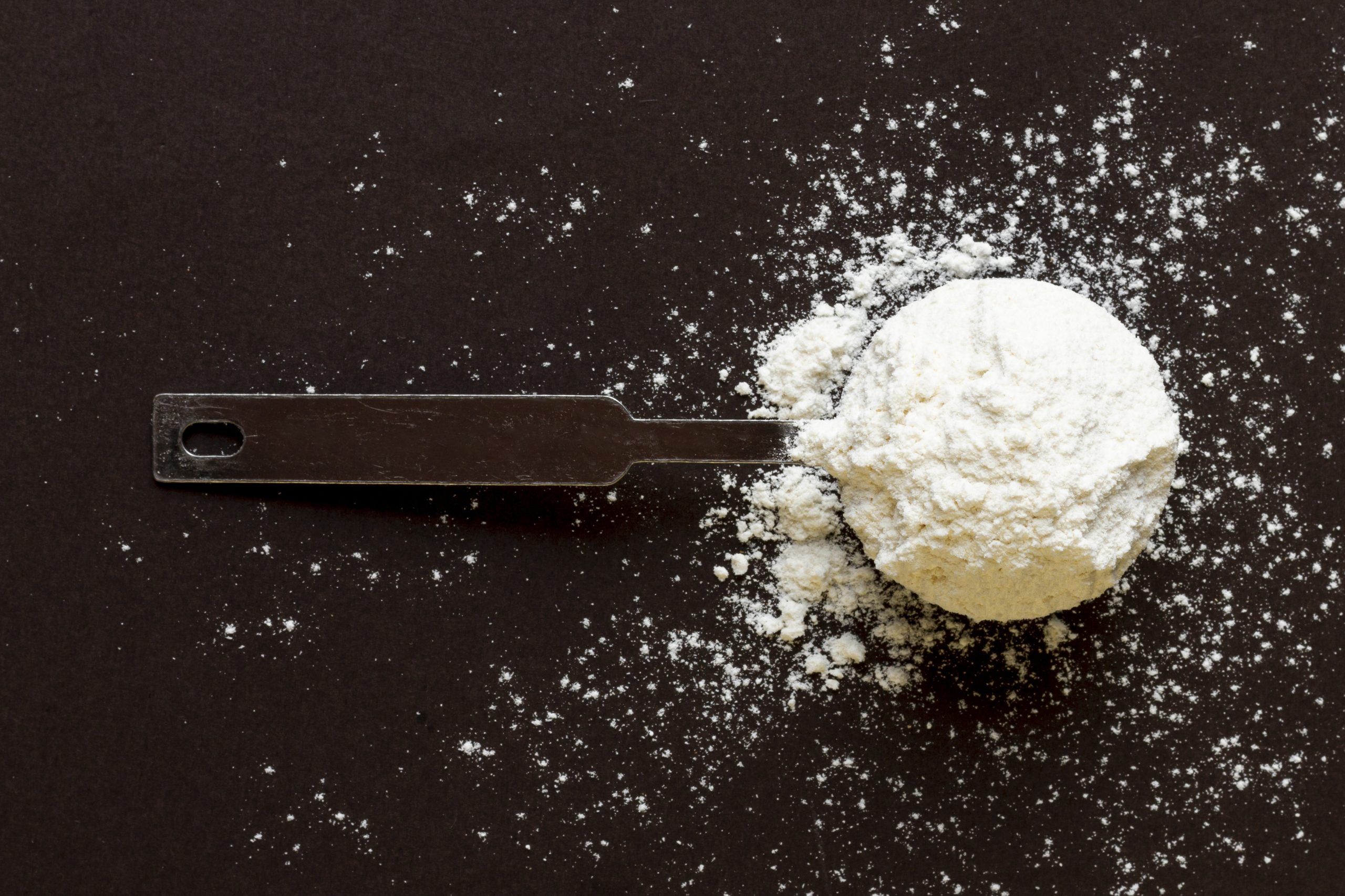 close up spoon with powder scaled 607882c6