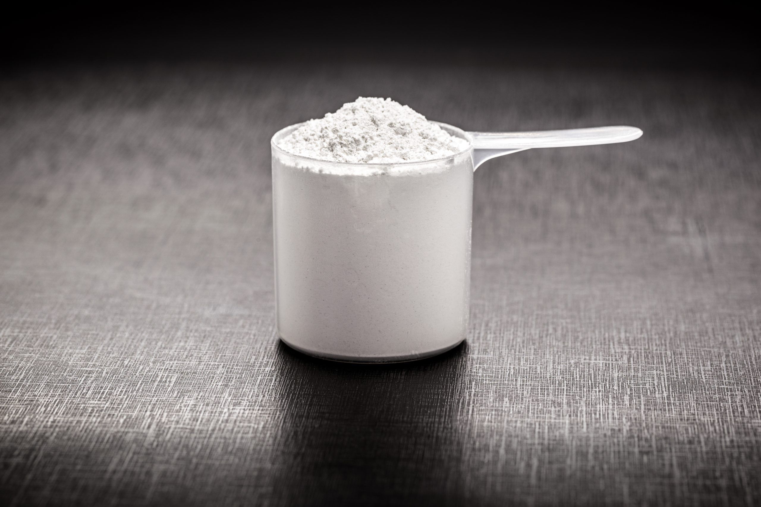 amino acid supplement sports use creatine measuring spoon hmb bcaa amino acid powdered vitamin sports nutrition concept scaled 63049b3d
